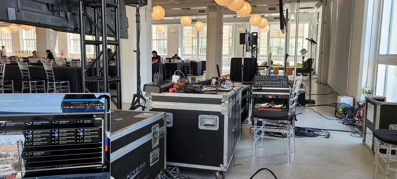 Event production area with temporary network gear staged for a live show